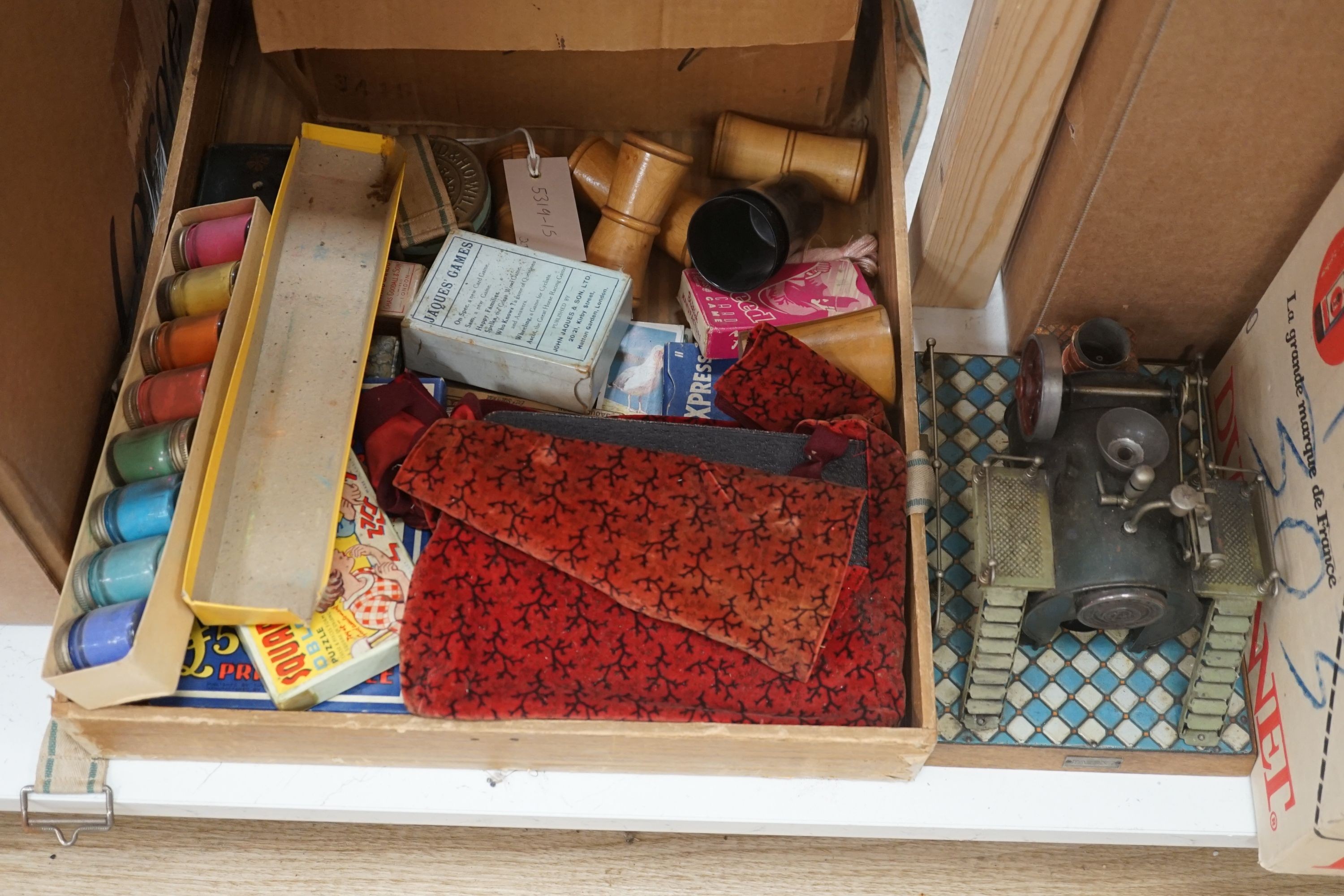 A Bing tinplate stationery engine, a boxed Jaques ‘The Angelo’, a toy fort and lead soldiers, a steam engine and other various toys and board games
